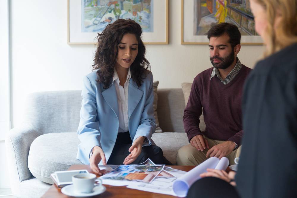 Two people reviewing plans at a resort property